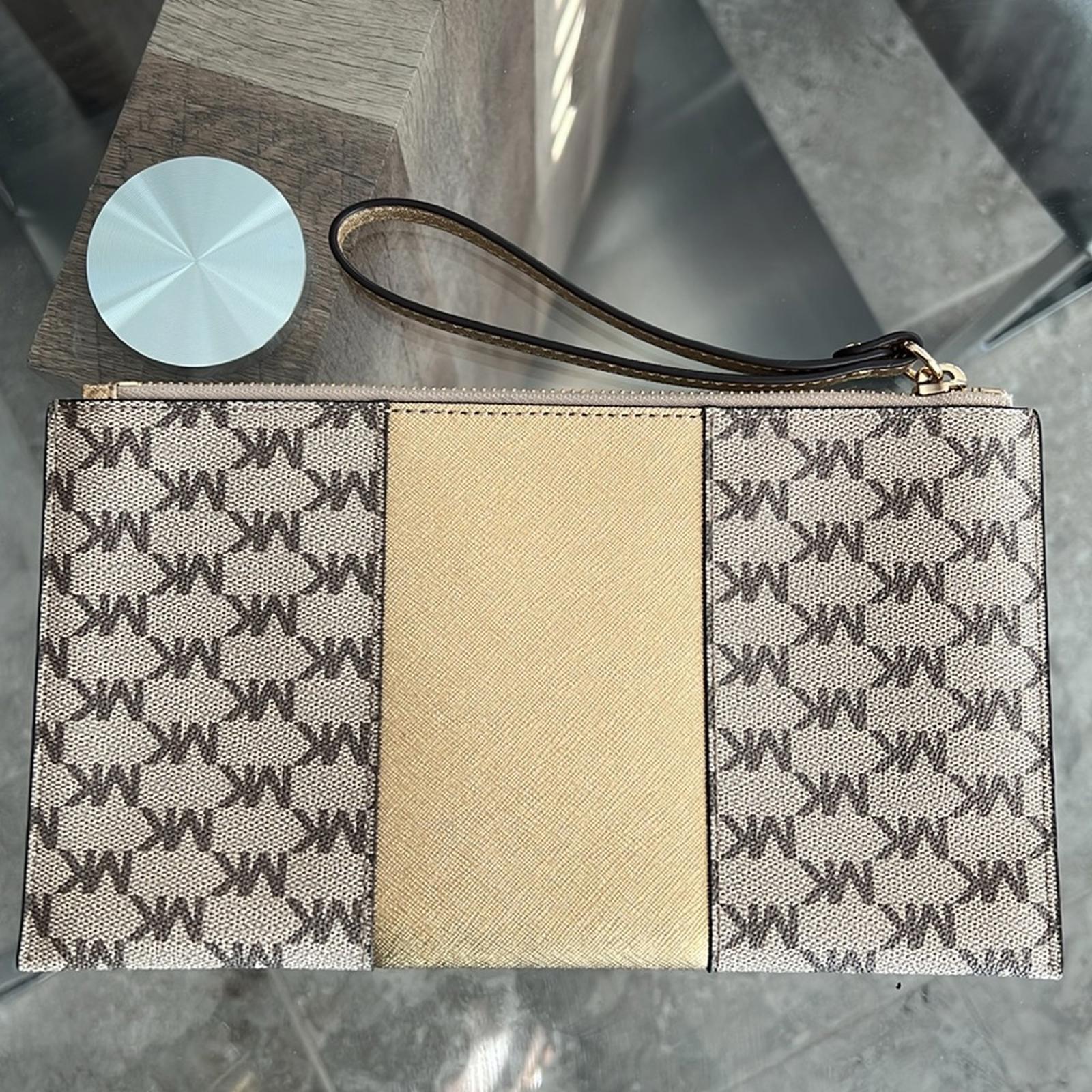 Michael Kors Large Center Stripe Zip Clutch MK Monogram, New w/o Tag Retail $98