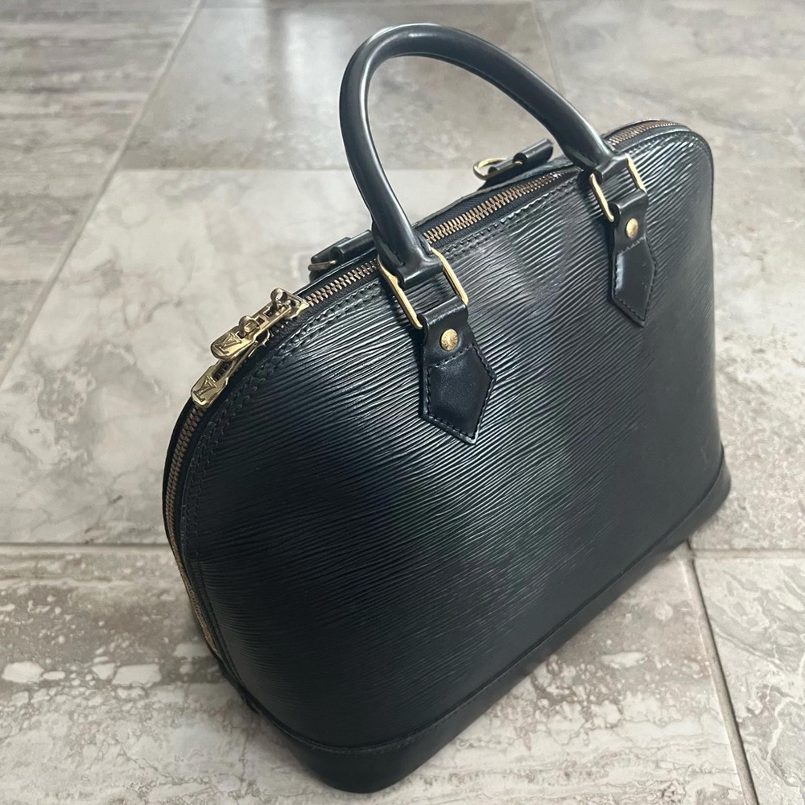 Louis Vuitton Alma PM Epi Leather Top Handle Bag Black Retail $1,394.99