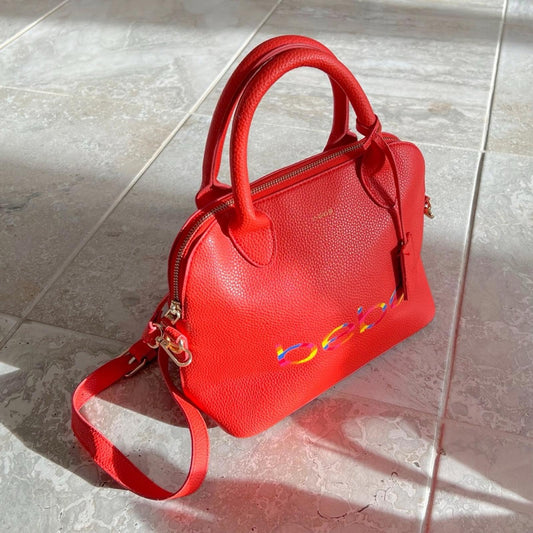 bebe Fabiola Dome Logo Satchel Crossbody Handbag, Ruby Red Orange Excellent