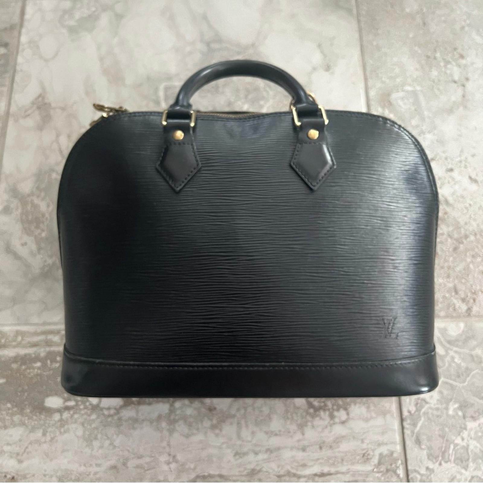 Louis Vuitton Alma PM Epi Leather Top Handle Bag Black Retail $1,394.99