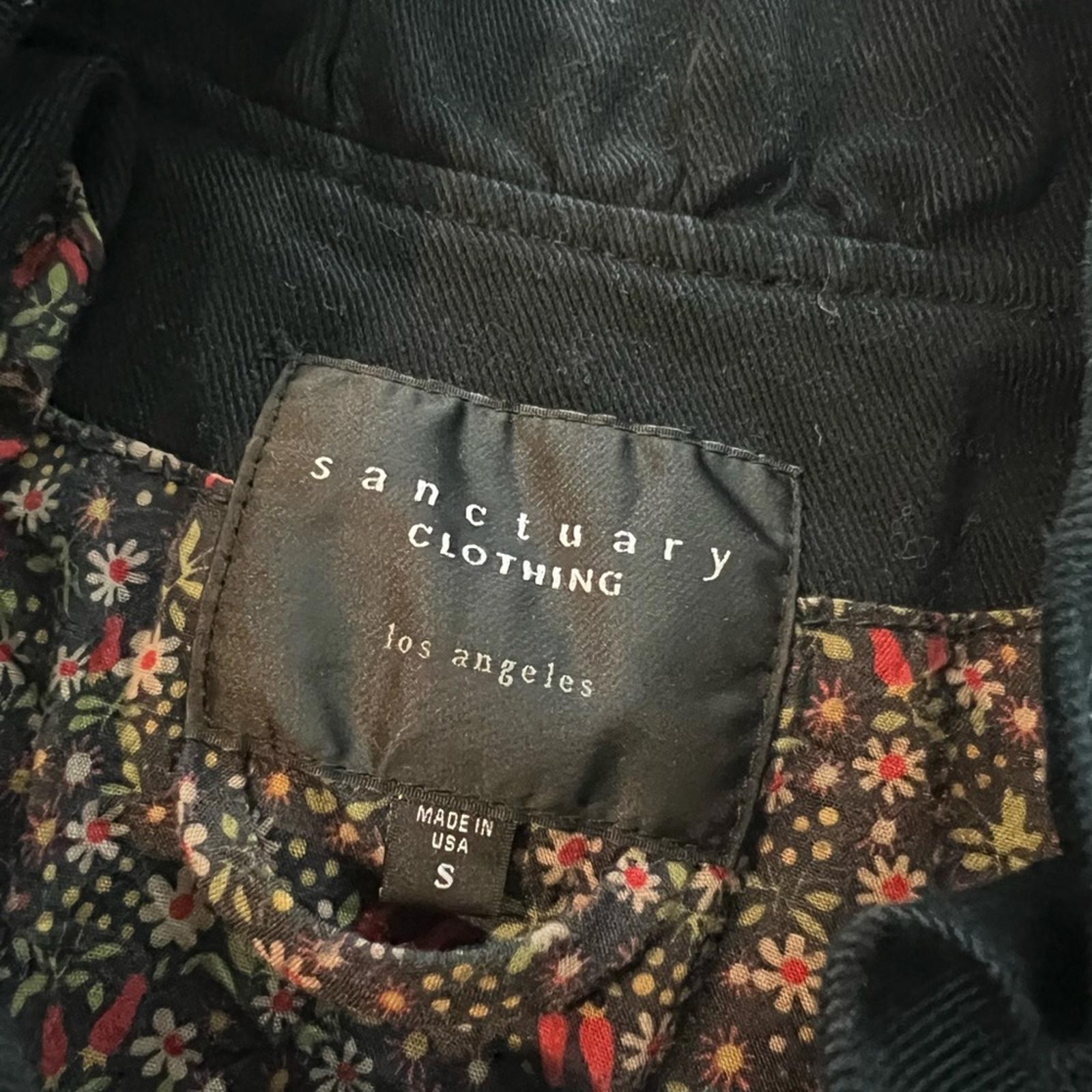 Anthropologie’s Sanctuary Ruffle Collar Denim Moto Jacket, Black Size S